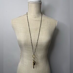 Long Black petite beaded necklace with stone and tassels charm